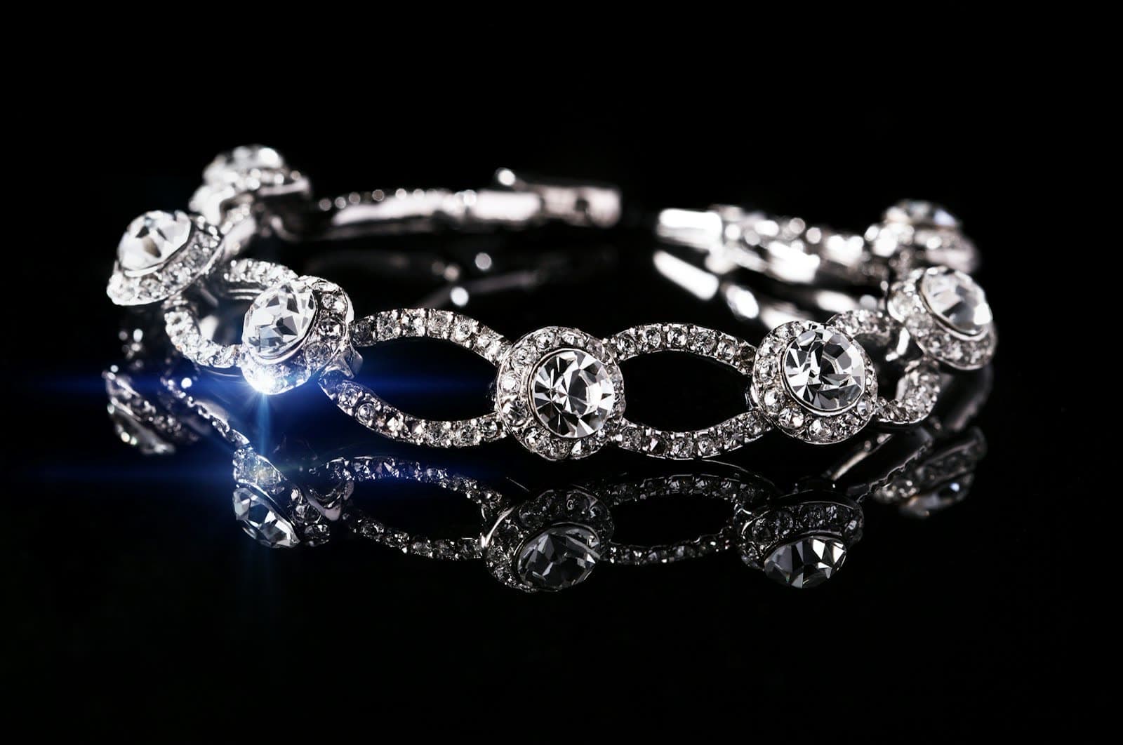 Polished gold-tone curb bracelet on a wrist