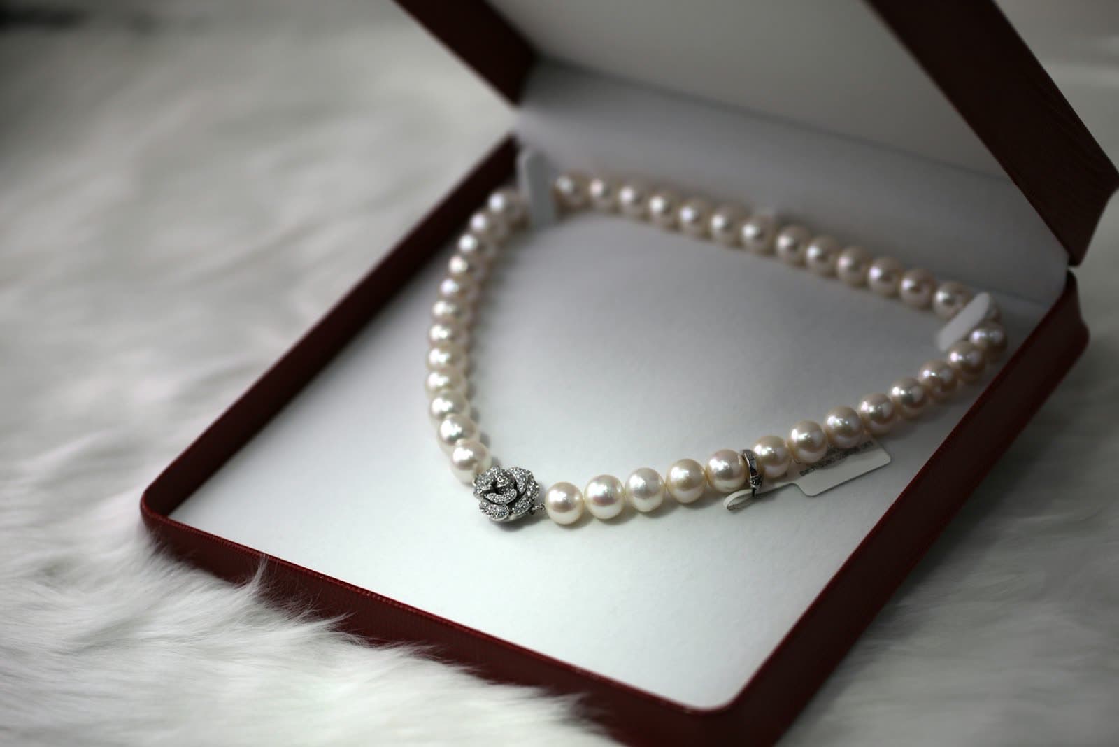 Flat lay of chains, rings, and small jewelry pieces