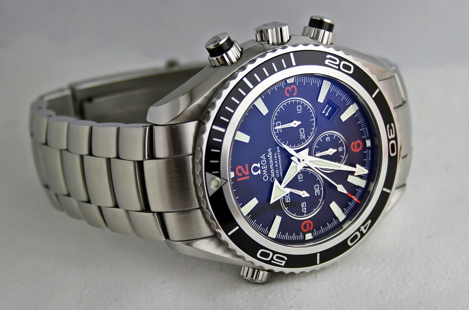Slim dress watch with a black dial and stick markers